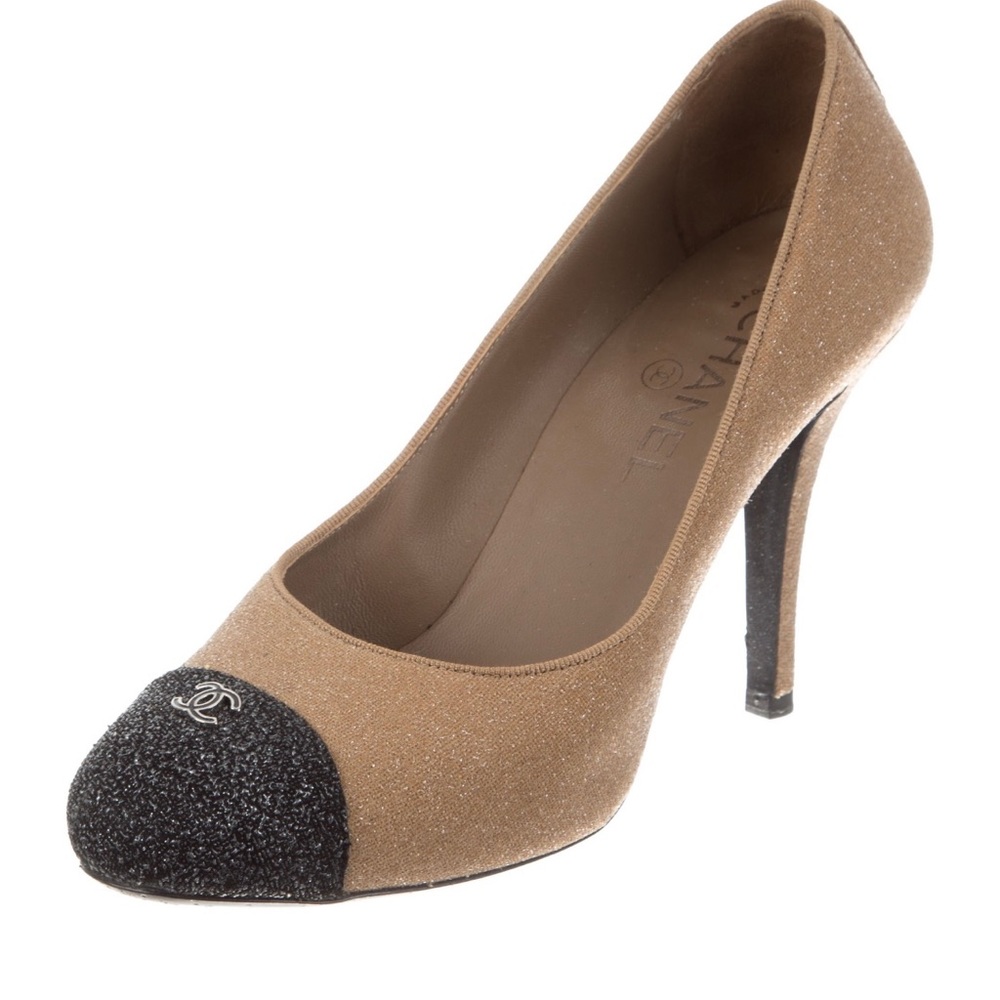 Chanel cap-toe pumps.
